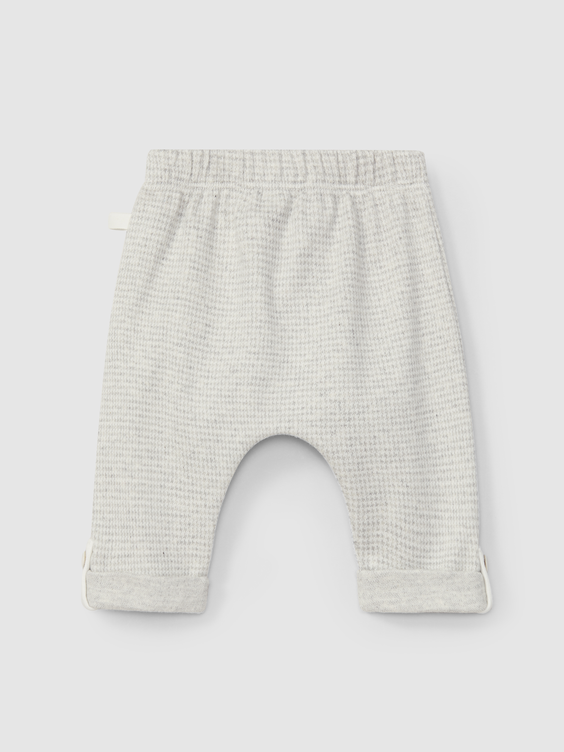Calças pull-up em malha jacquard de pied-de-poule