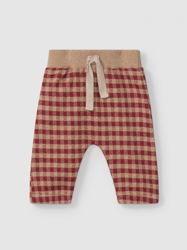 Cal�as pull-up em malha jacquard xadrez
