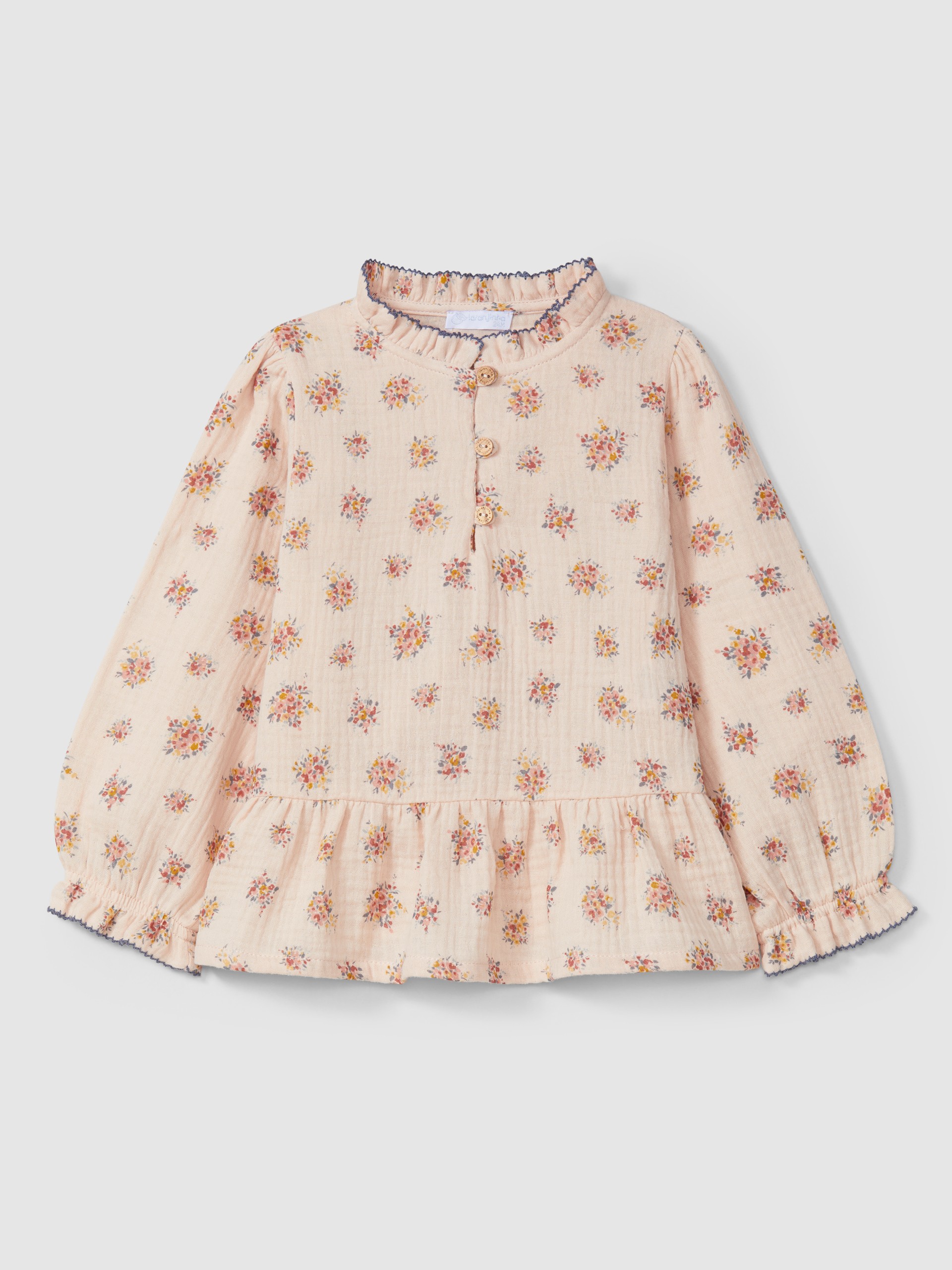 Blusa de flores de algodón orgánico
