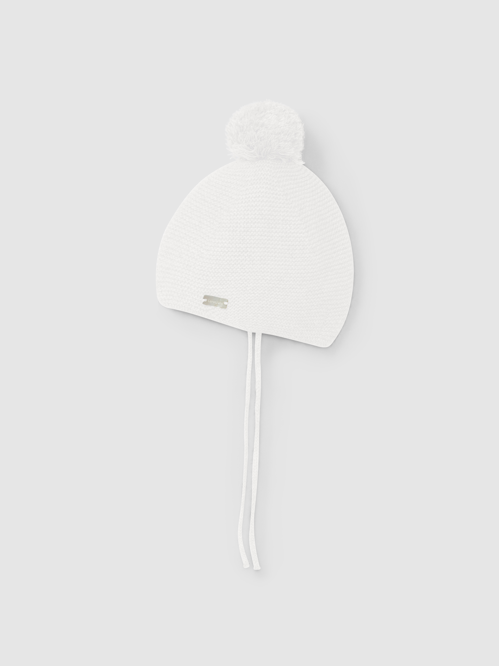 Knitted beanie with pom-pom