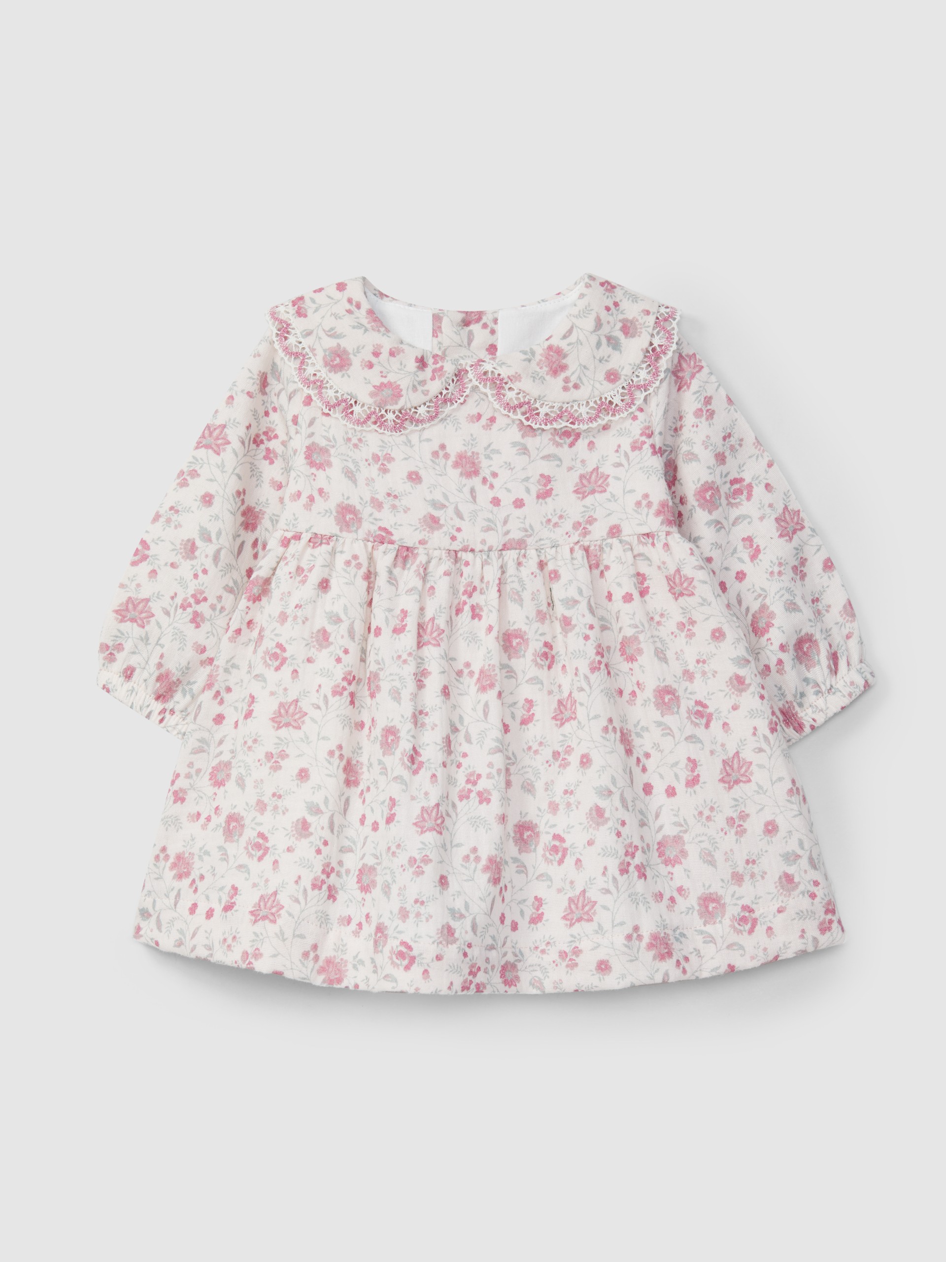 Dress in organic gauze with delicate lace detail