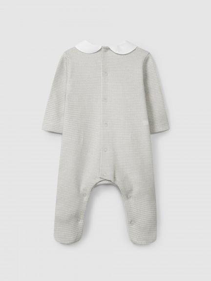 Babygrow in pied-de-poule jacquard knit with round collar Babygrow in pied-de-poule jacquard knit with round collar