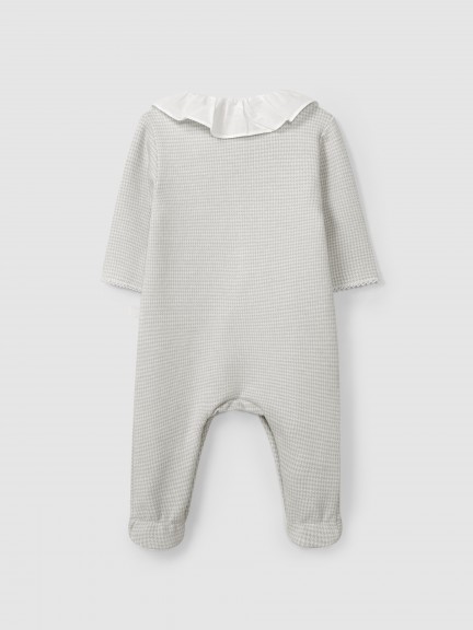 Babygrow in pied-de-poule jacquard knit with ruffled collar Babygrow in pied-de-poule jacquard knit with ruffled collar