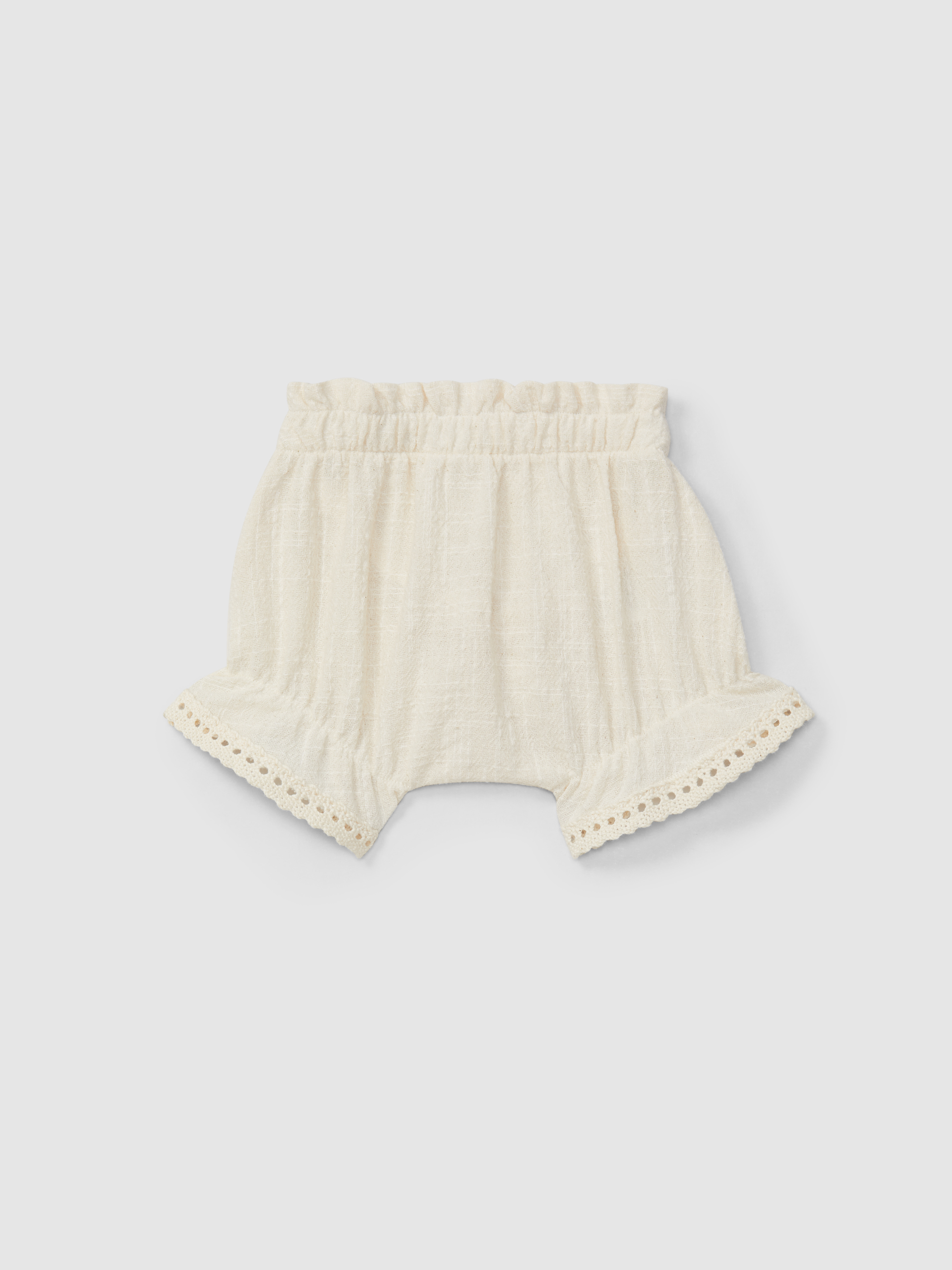 Blouse and shorts set with embroidery and lace details