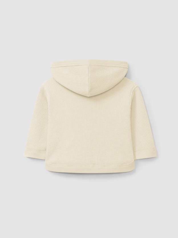 Gilet à capuche en maille gaufrée Gilet à capuche en maille gaufrée