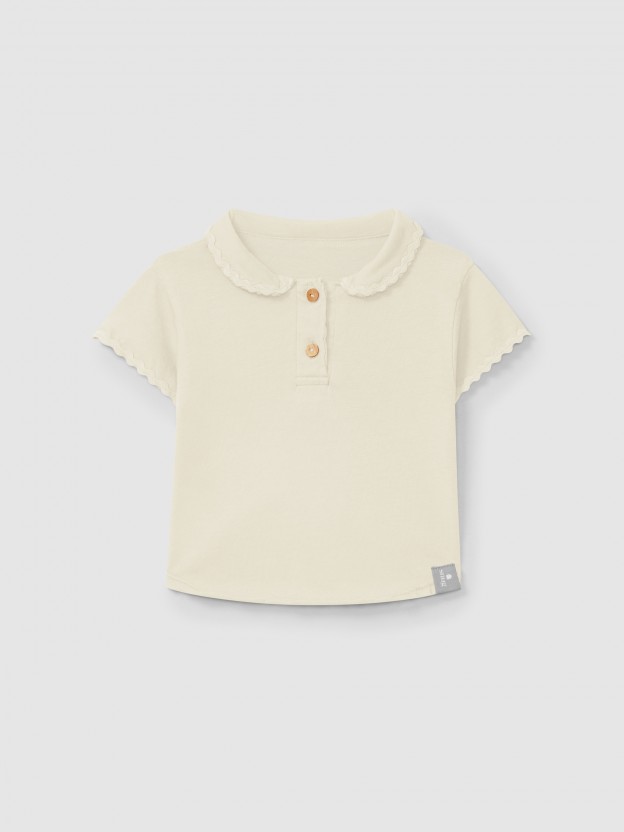 Polo liso con detalle de zigzag Polo liso con detalle de zigzag