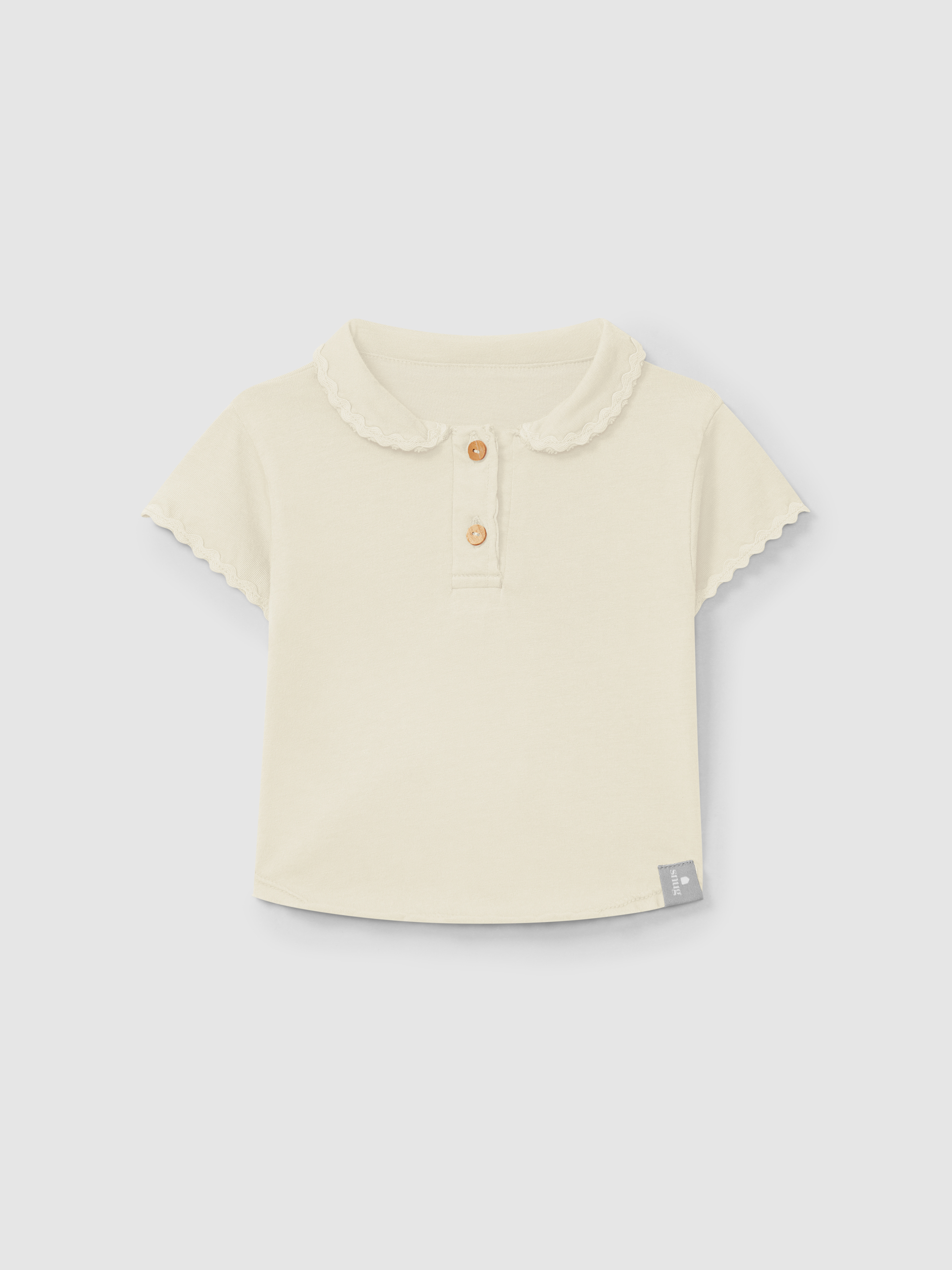 Polo liso con detalle de zigzag