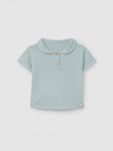 Polo uni avec d�tail de galon