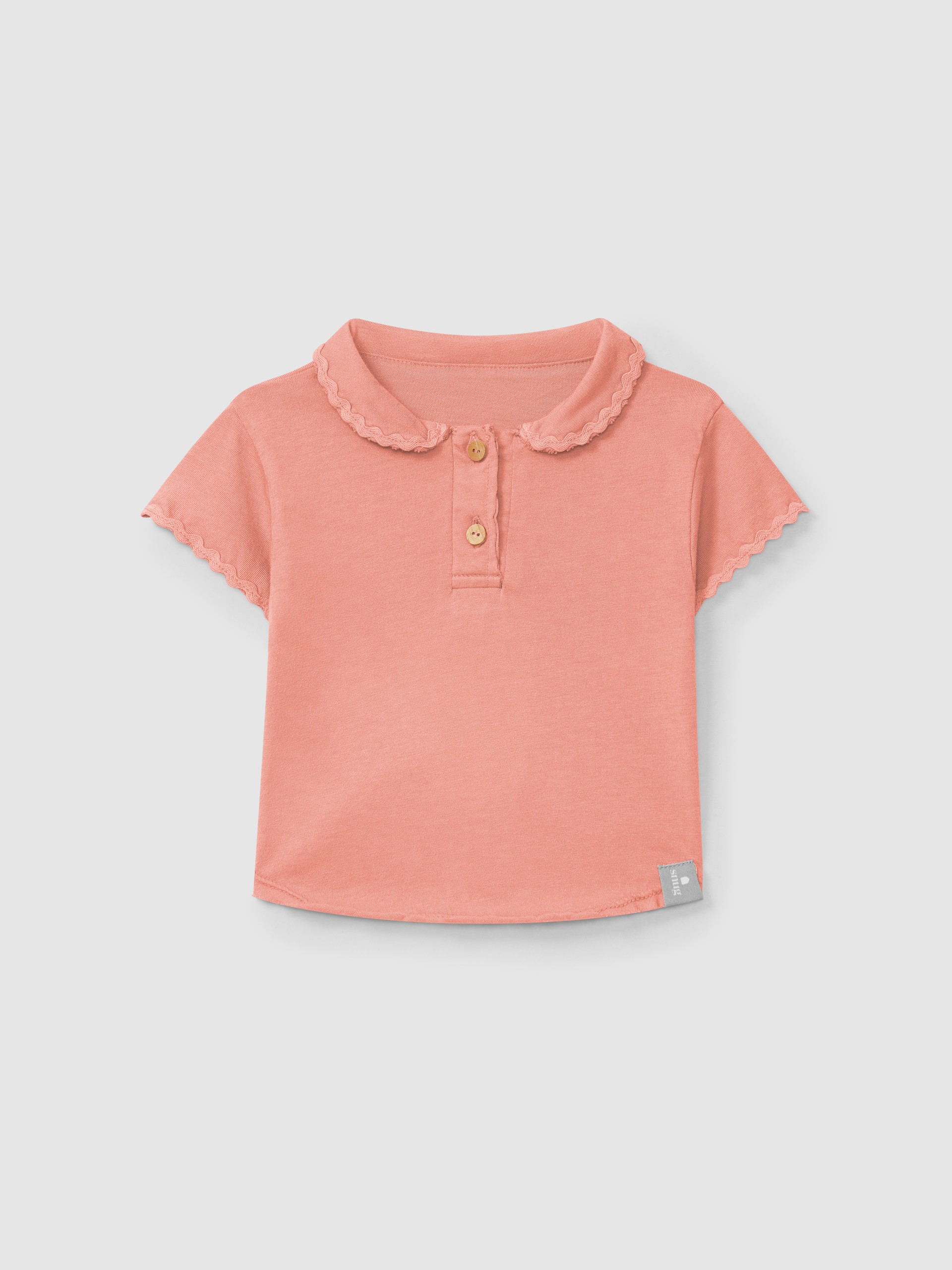 Polo liso con detalle de zigzag