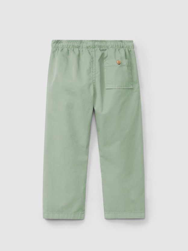 Pantalon pull-up uni en serg� � trois poches