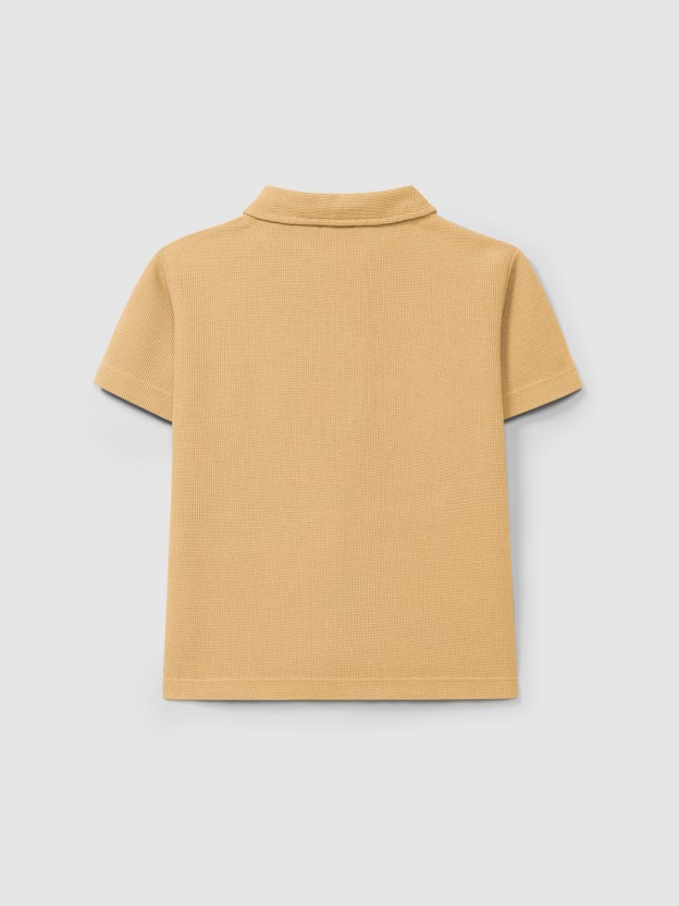 Plain polo shirt in waffle weave Plain polo shirt in waffle weave