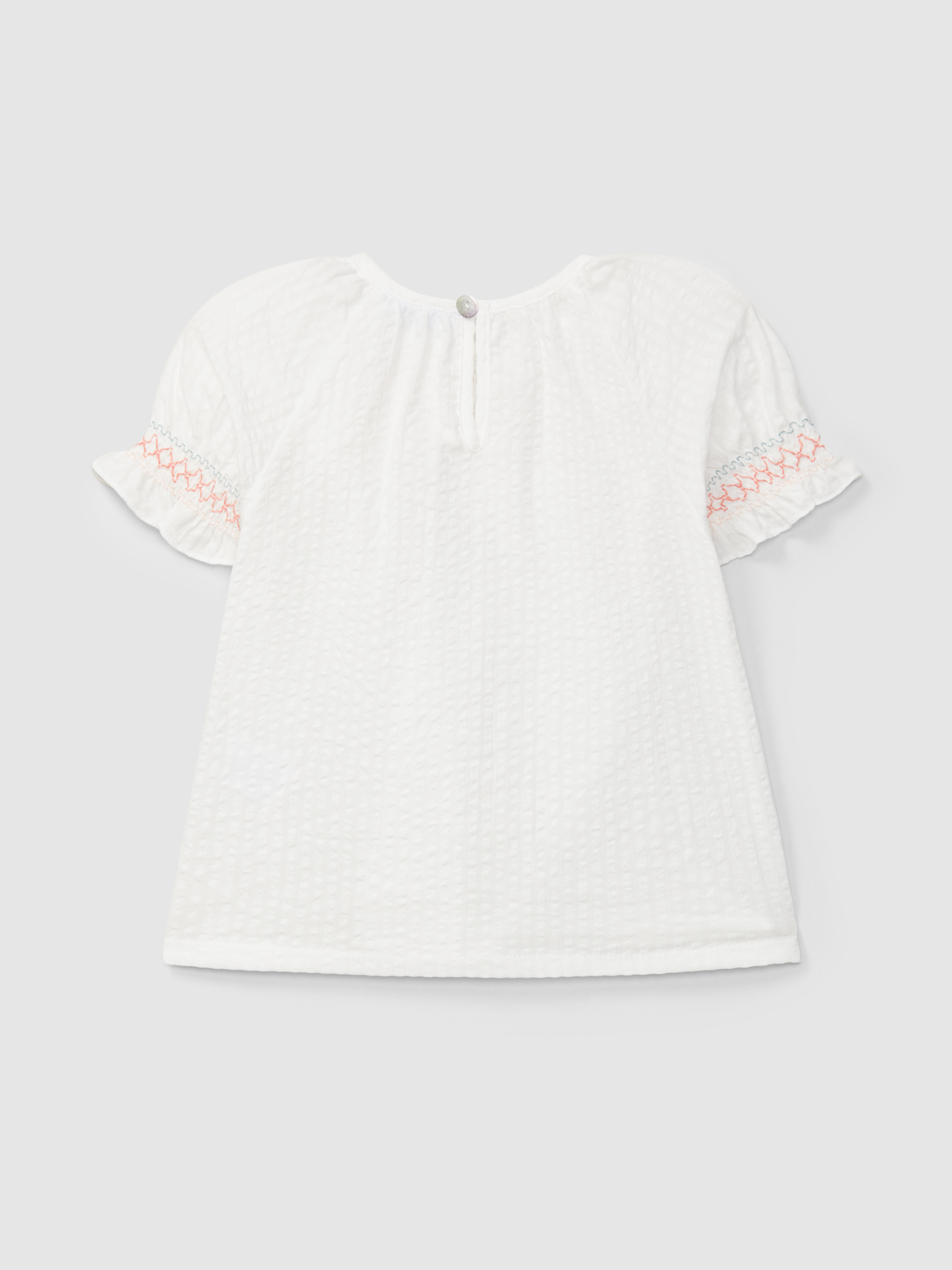 Blusa seersucker com detalhe de smocks