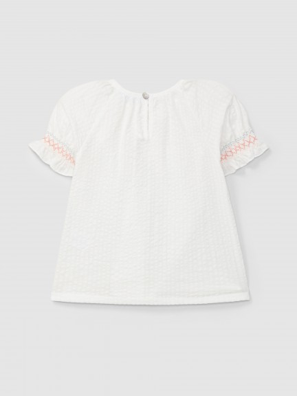 Seersucker blouse with smocking detail Seersucker blouse with smocking detail