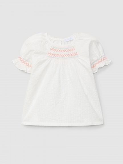Seersucker blouse with smocking detail Seersucker blouse with smocking detail