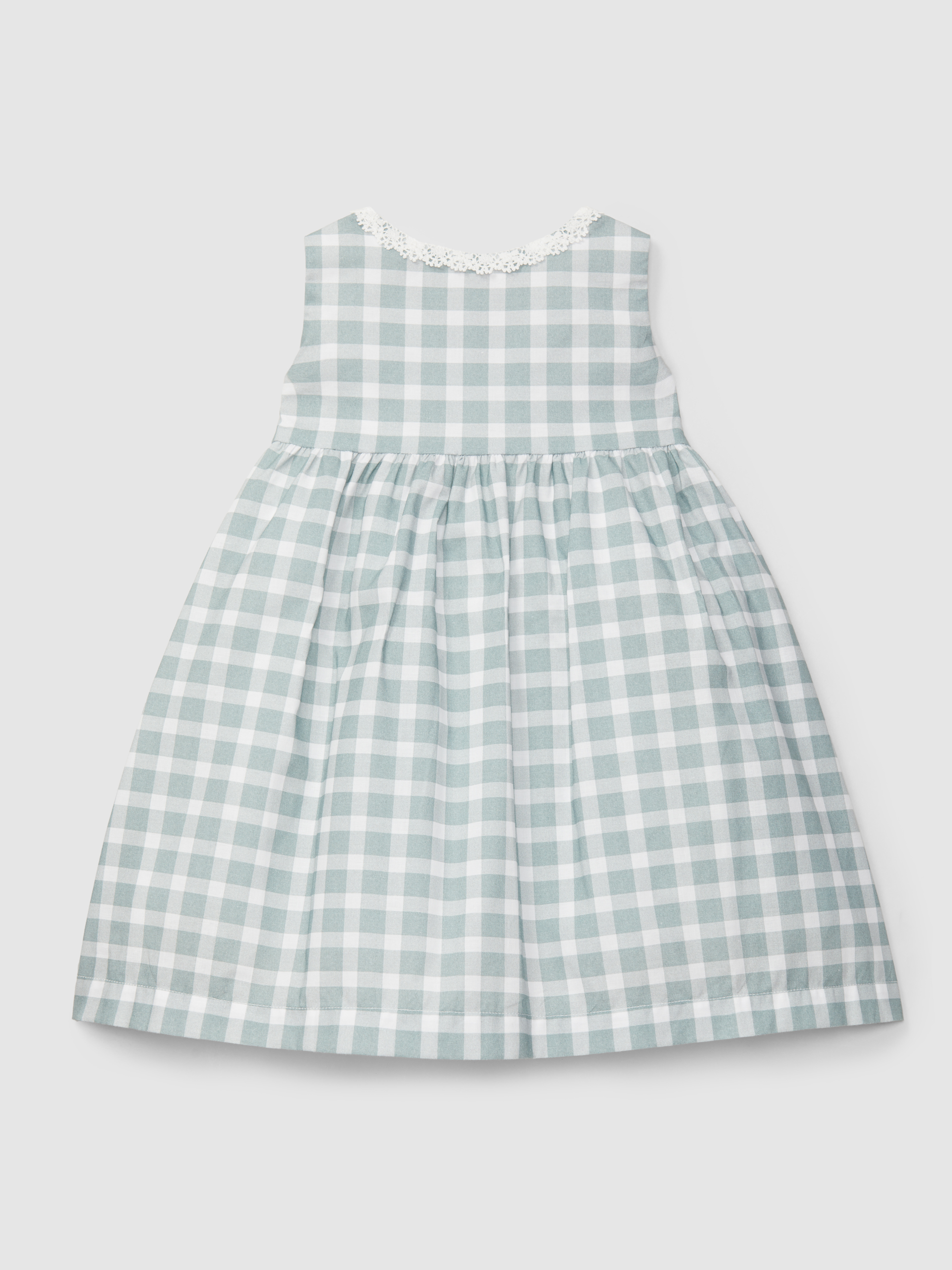 Robe à carreaux avec détails en dentelle