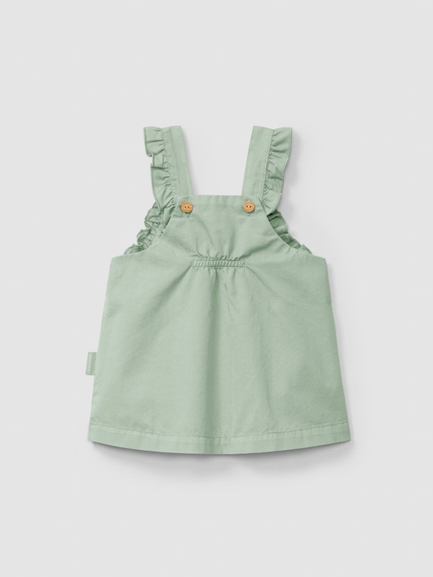 Dungaree skirt in twill with ruffled detail on the straps Dungaree skirt in twill with ruffled detail on the straps