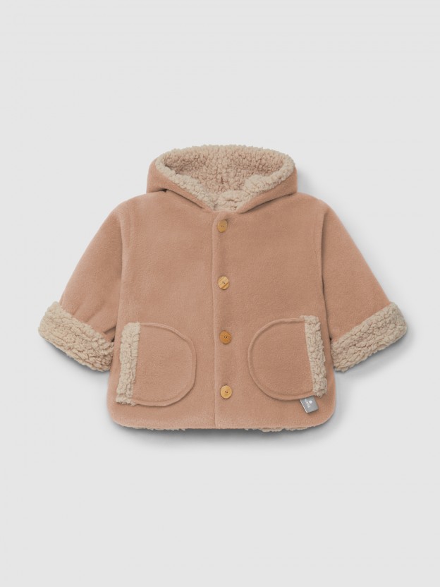 Gilet polaire � capuche et doublure en fourrure