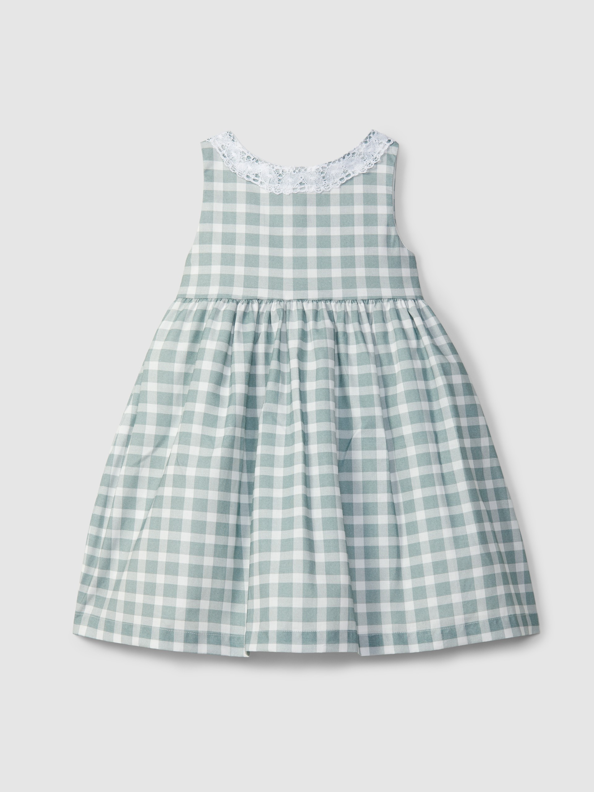 Robe à carreaux avec détails en dentelle
