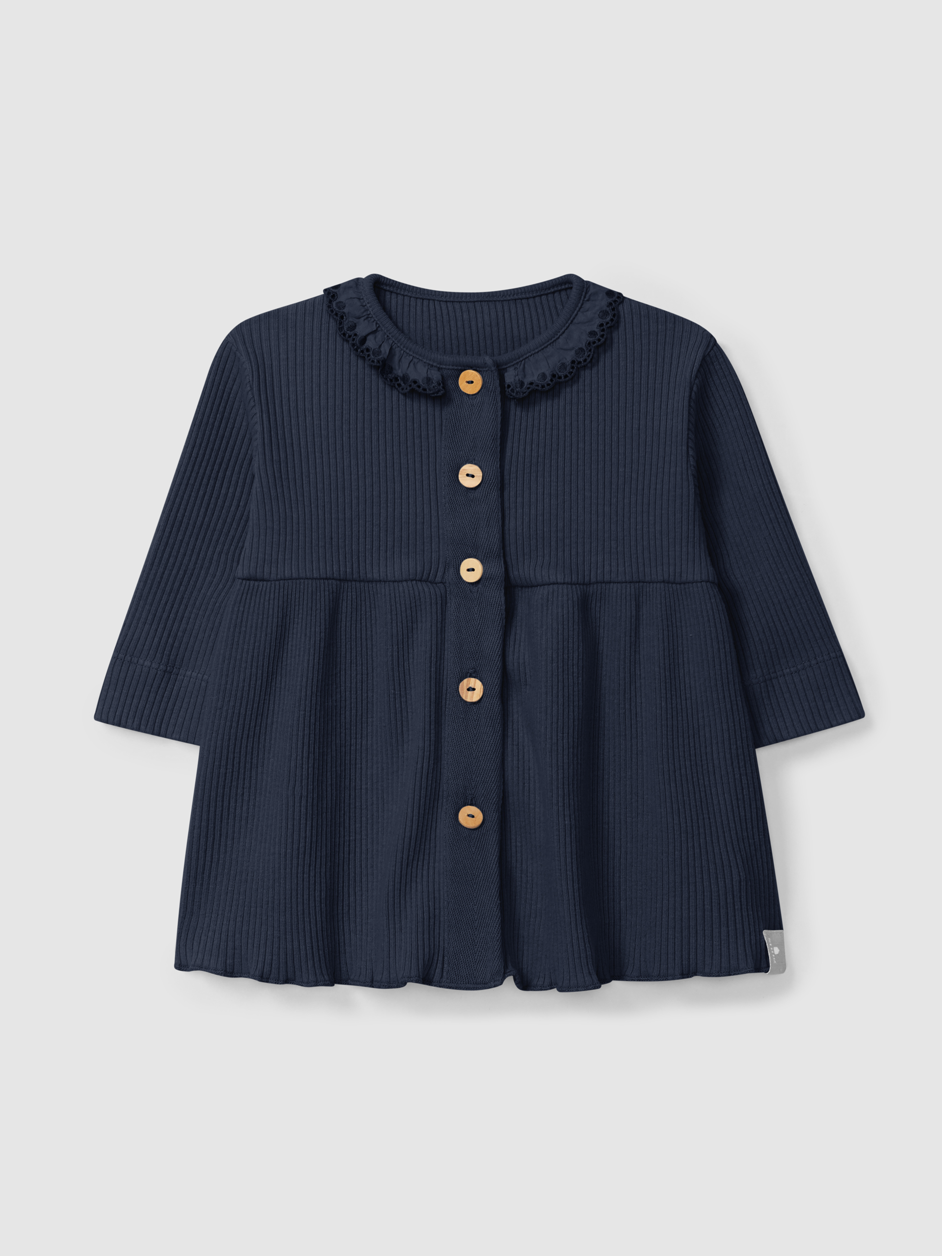 Robe en maille cannelée à col à volant