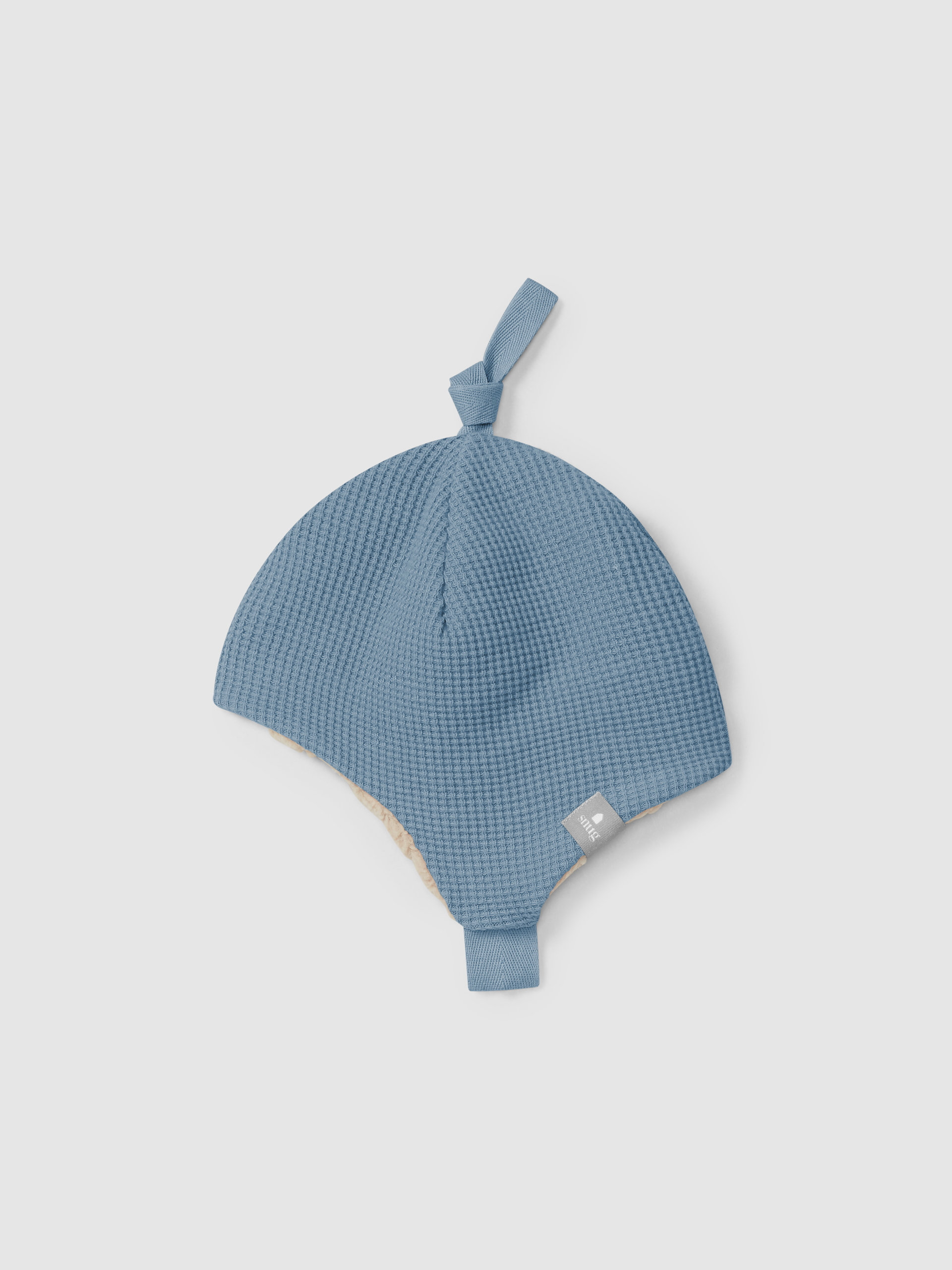 Gorro em malha waffle com interior de pelo