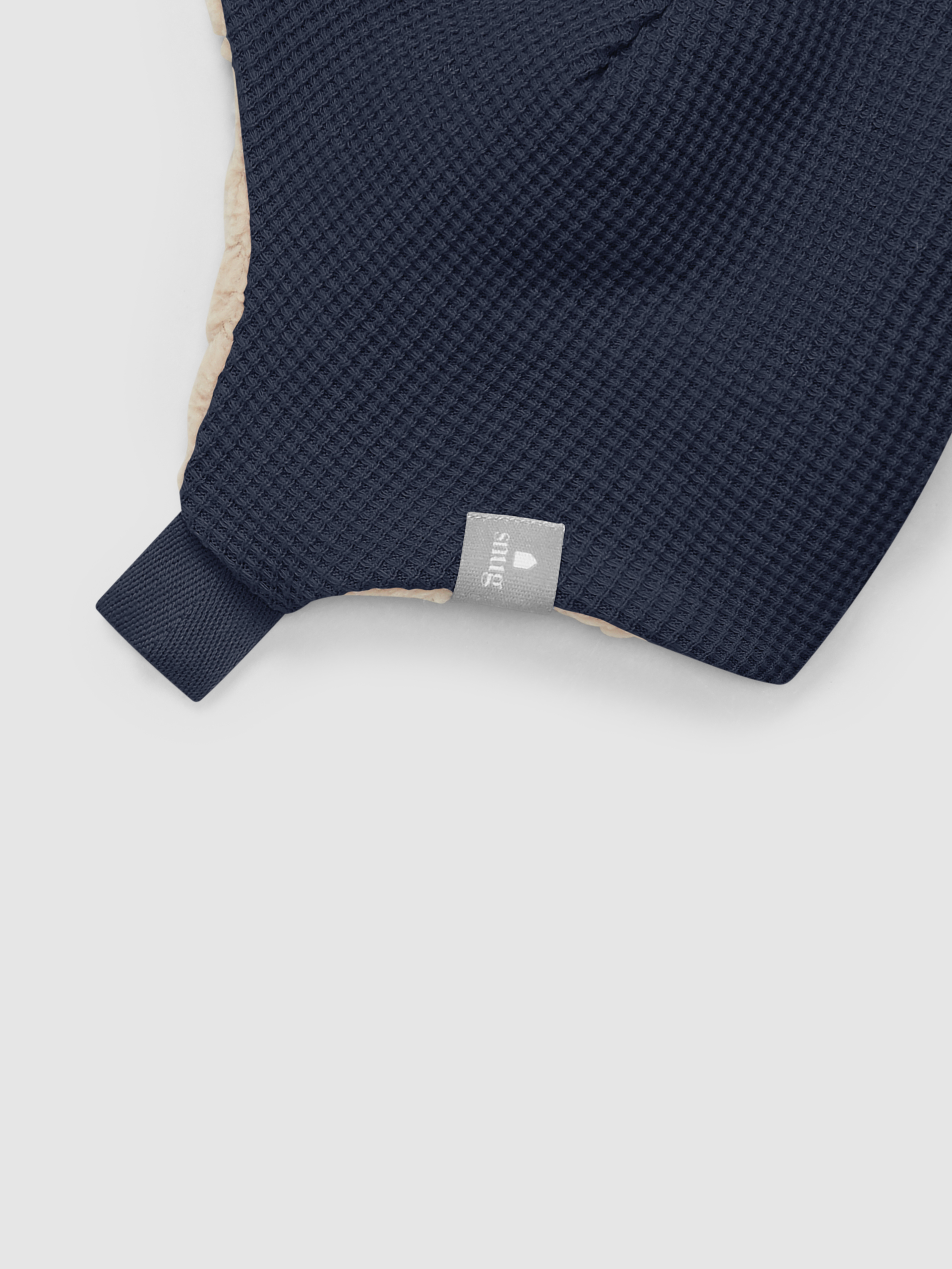 Gorro em malha waffle com interior de pelo
