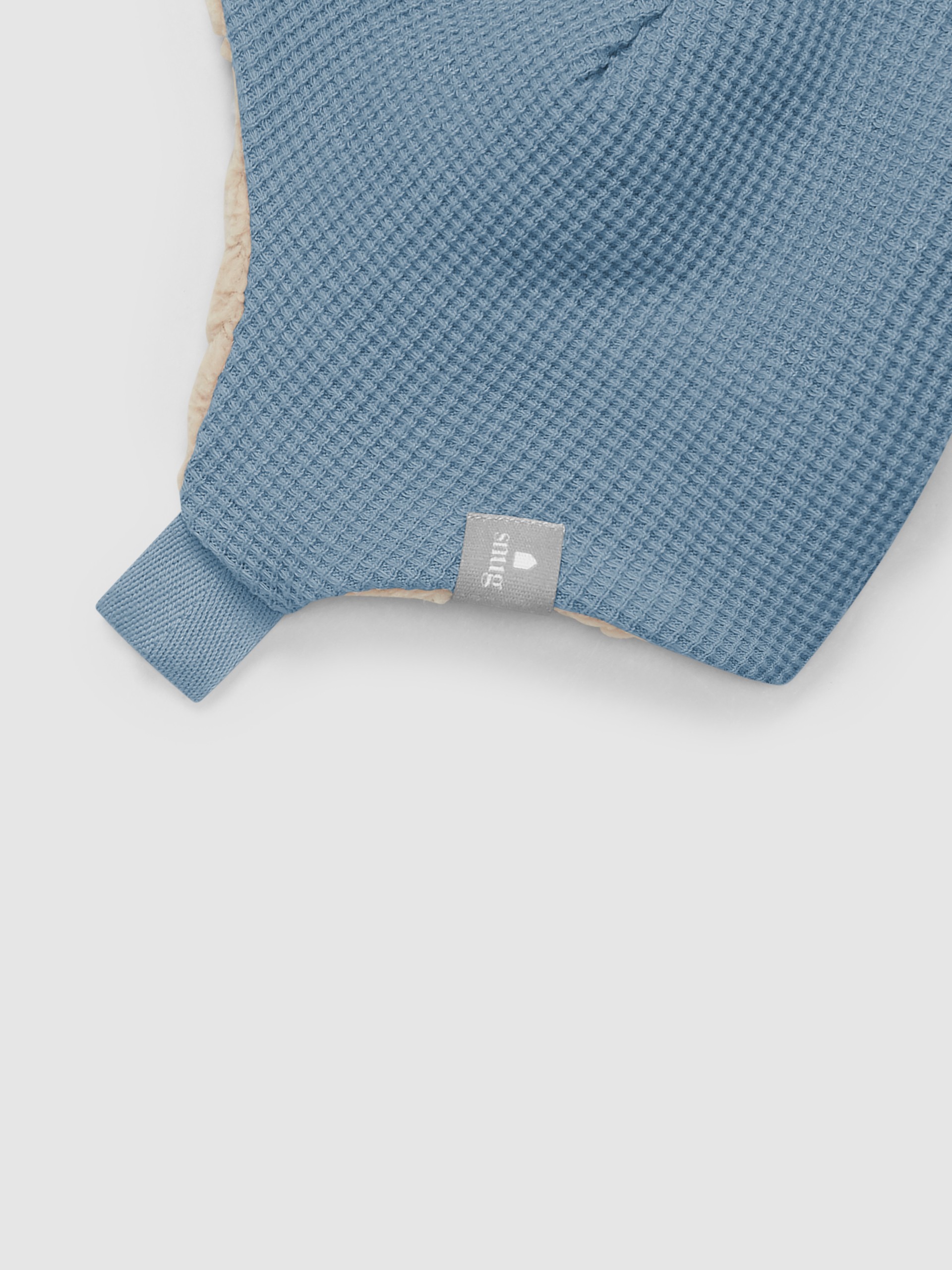 Gorro em malha waffle com interior de pelo