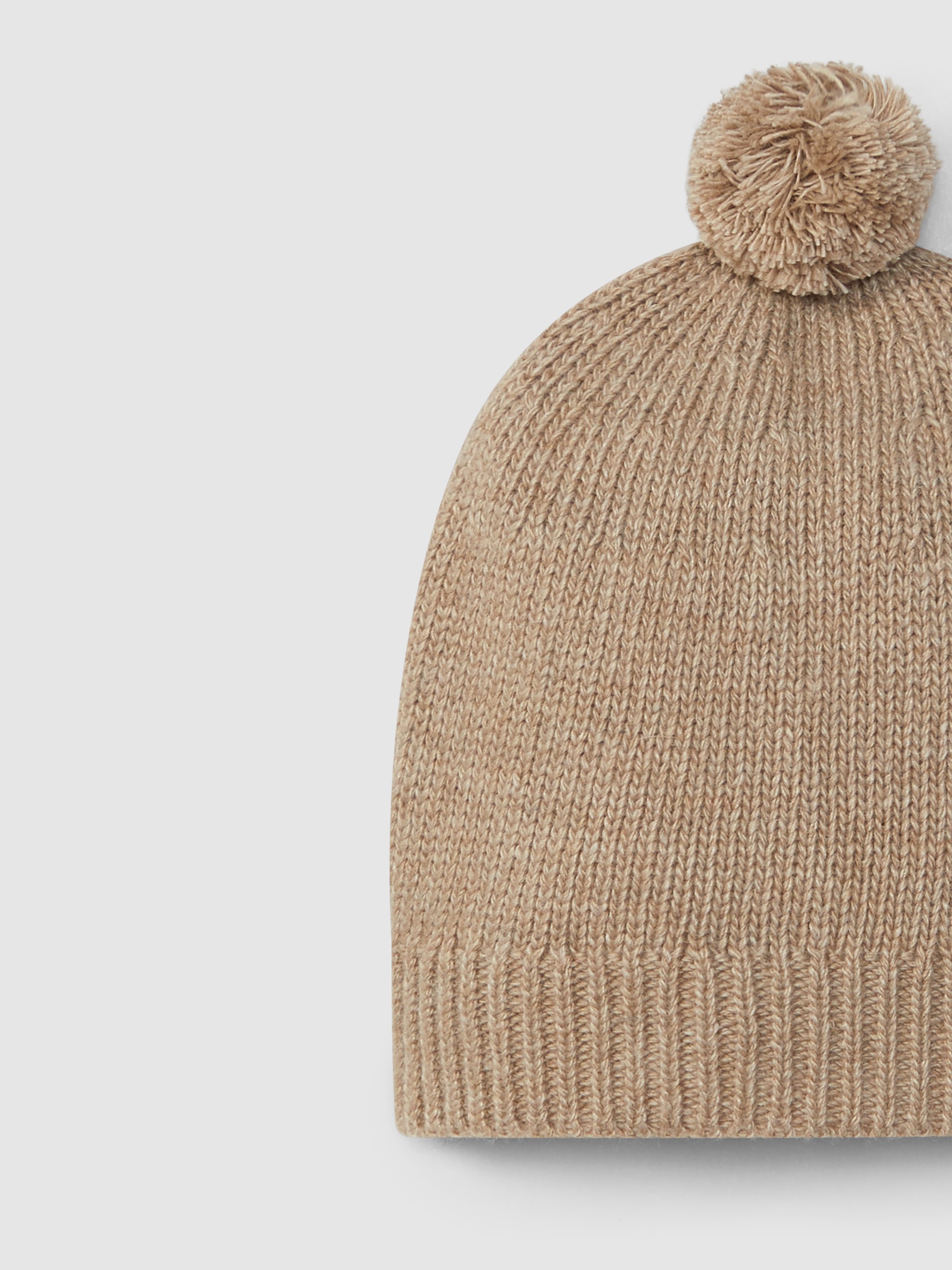 Knitted beanie with pom-pom