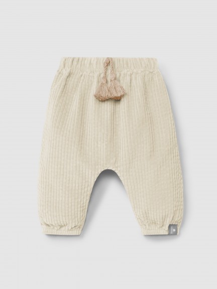 Pull-up pants in ribbed velvet and drawstring detail with pom-pom Pull-up pants in ribbed velvet and drawstring detail with pom-pom