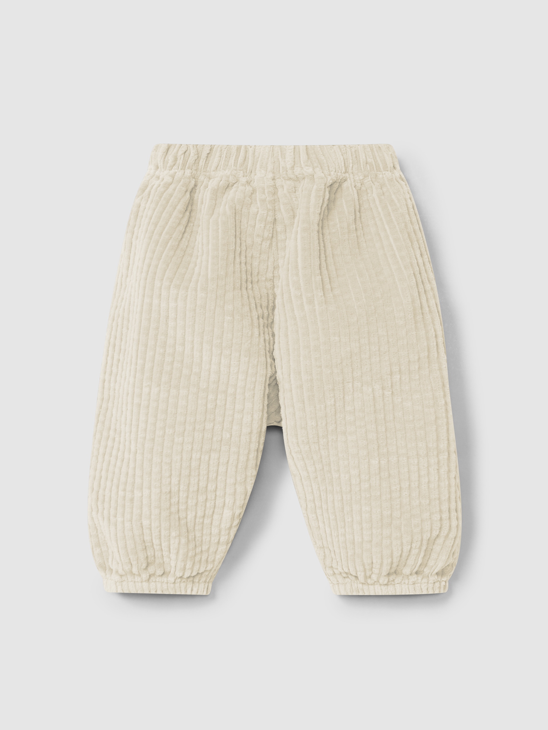 Pull-up pants in ribbed velvet and drawstring detail with pom-pom