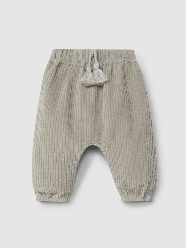 Pull-up pants in ribbed velvet and drawstring detail with pom-pom