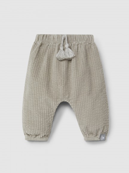 Calças pull-up em veludo canelado e detalhe de cordão com pom-pom Calças pull-up em veludo canelado e detalhe de cordão com pom-pom