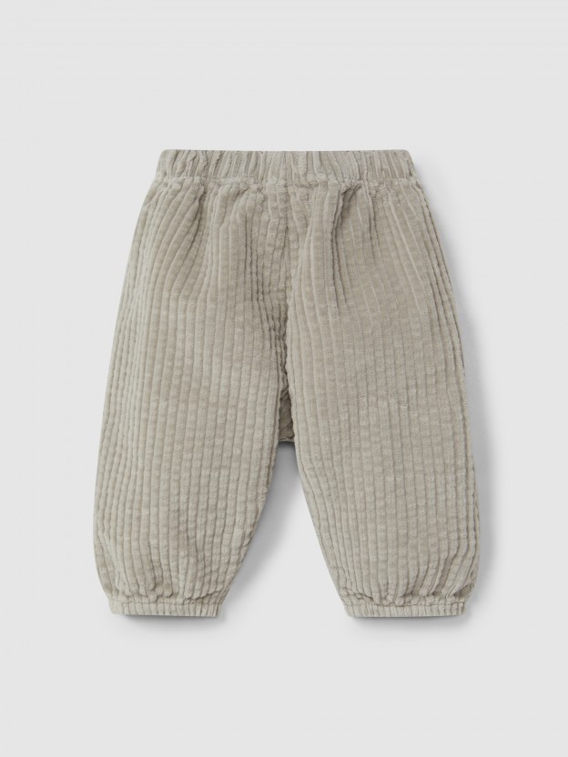 Pull-up pants in ribbed velvet and drawstring detail with pom-pom