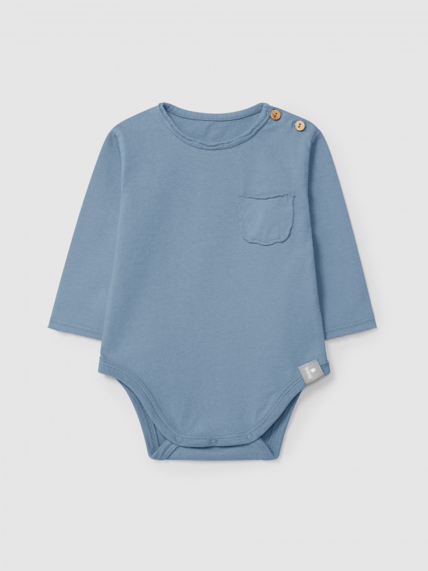 Collarless bodysuit in organic cotton with pocket Collarless bodysuit in organic cotton with pocket