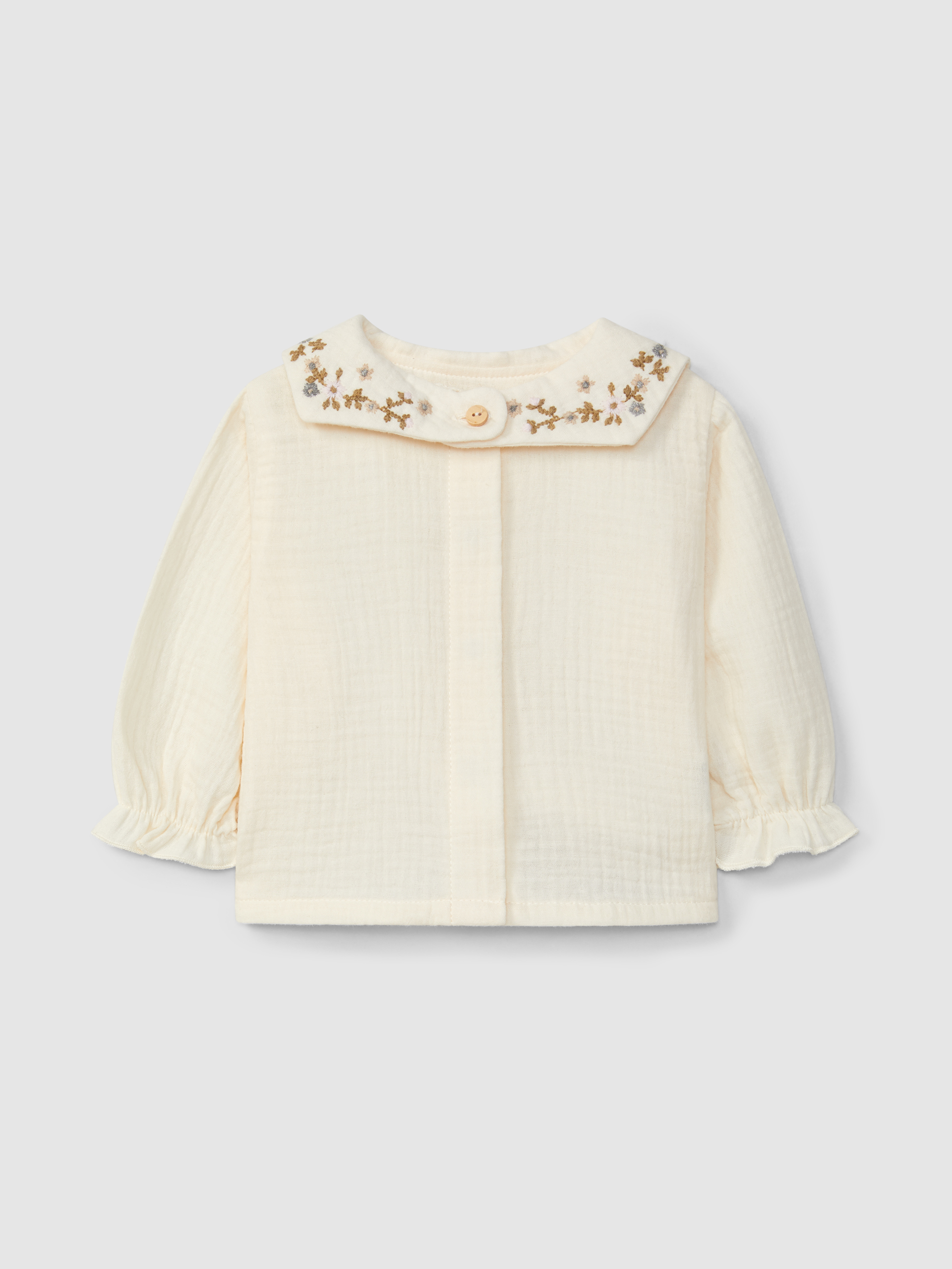 Blusa em musseline com gola de flores bordadas