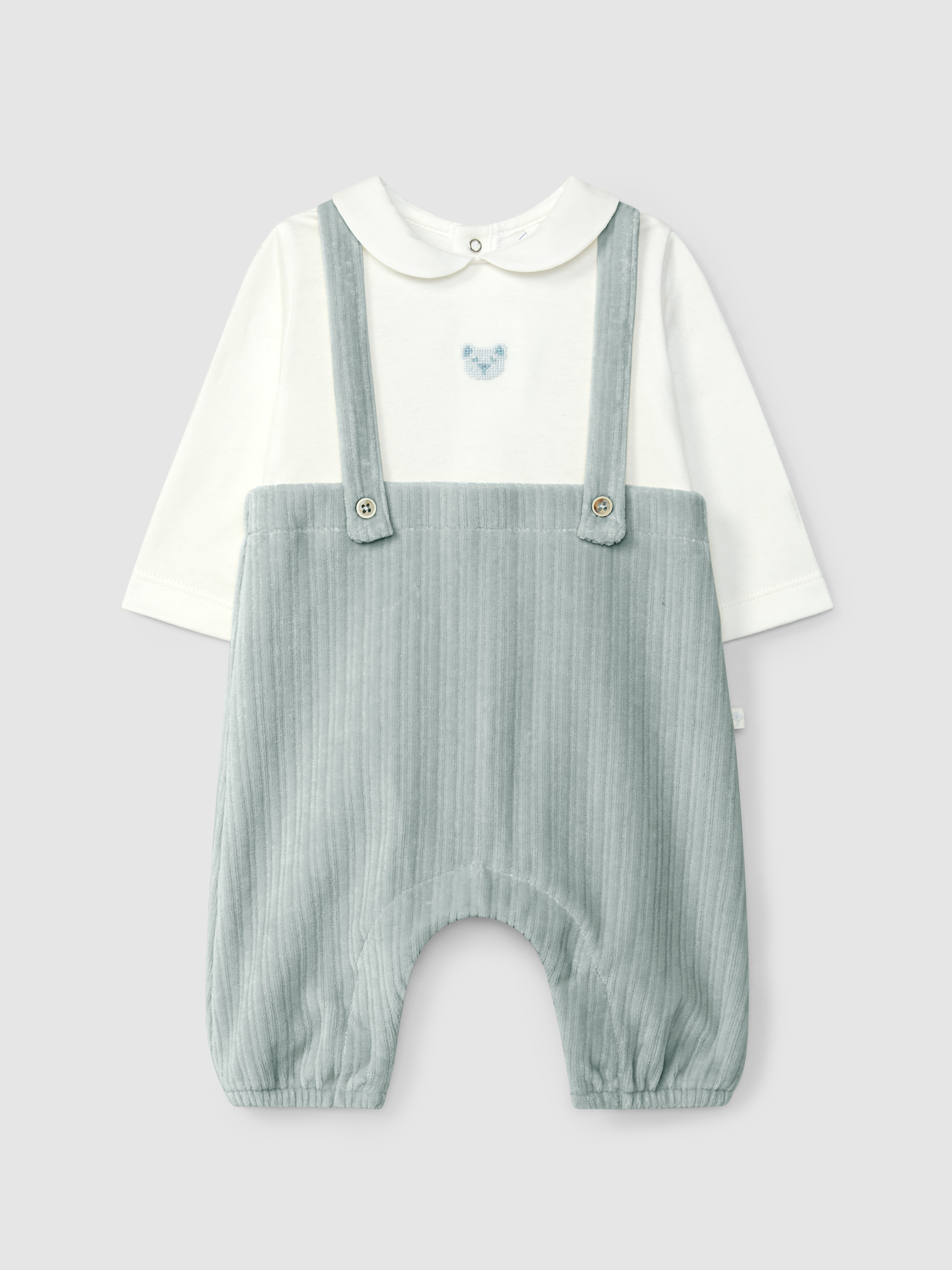 Ensemble deux-en-un en velours cannelé et détail de broderie sur la poitrine