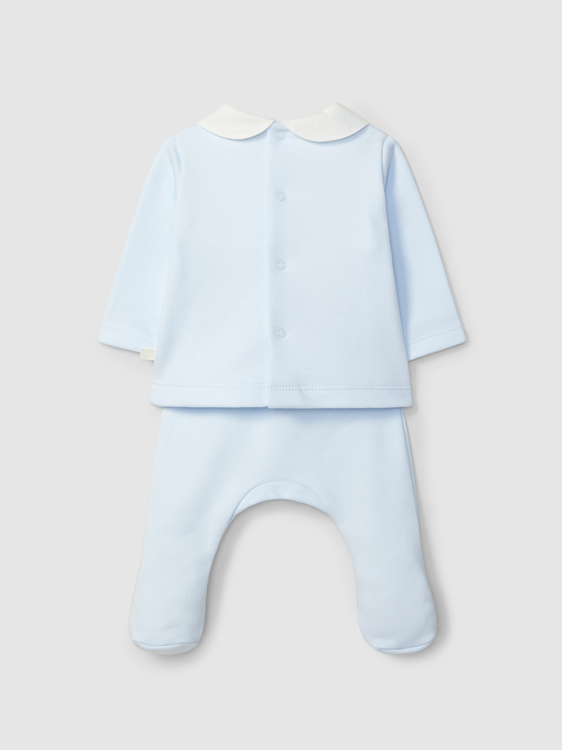 Traje de dos piezas detalle de smocks