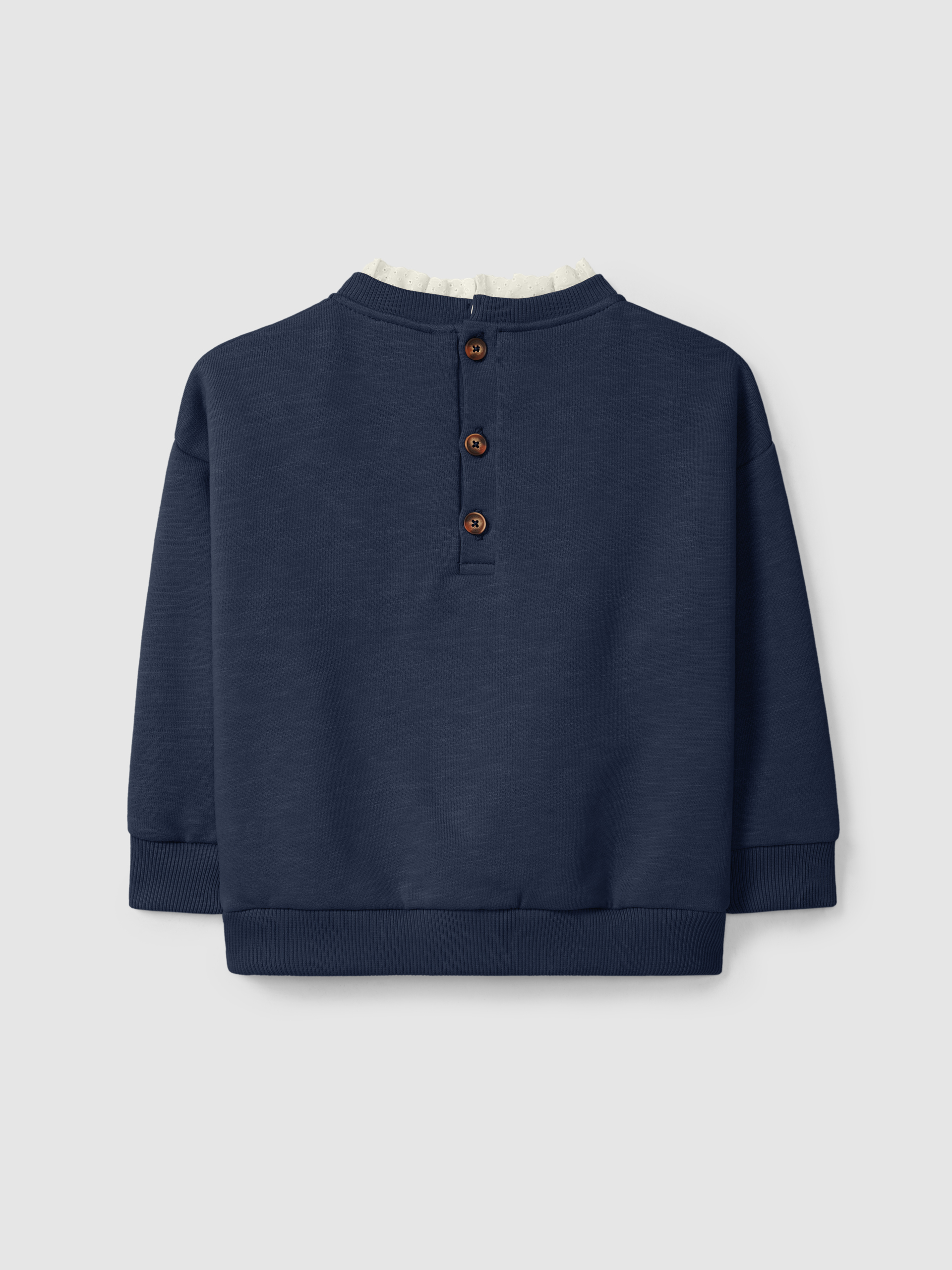 Sudadera flor y detalle de bordado inglés
