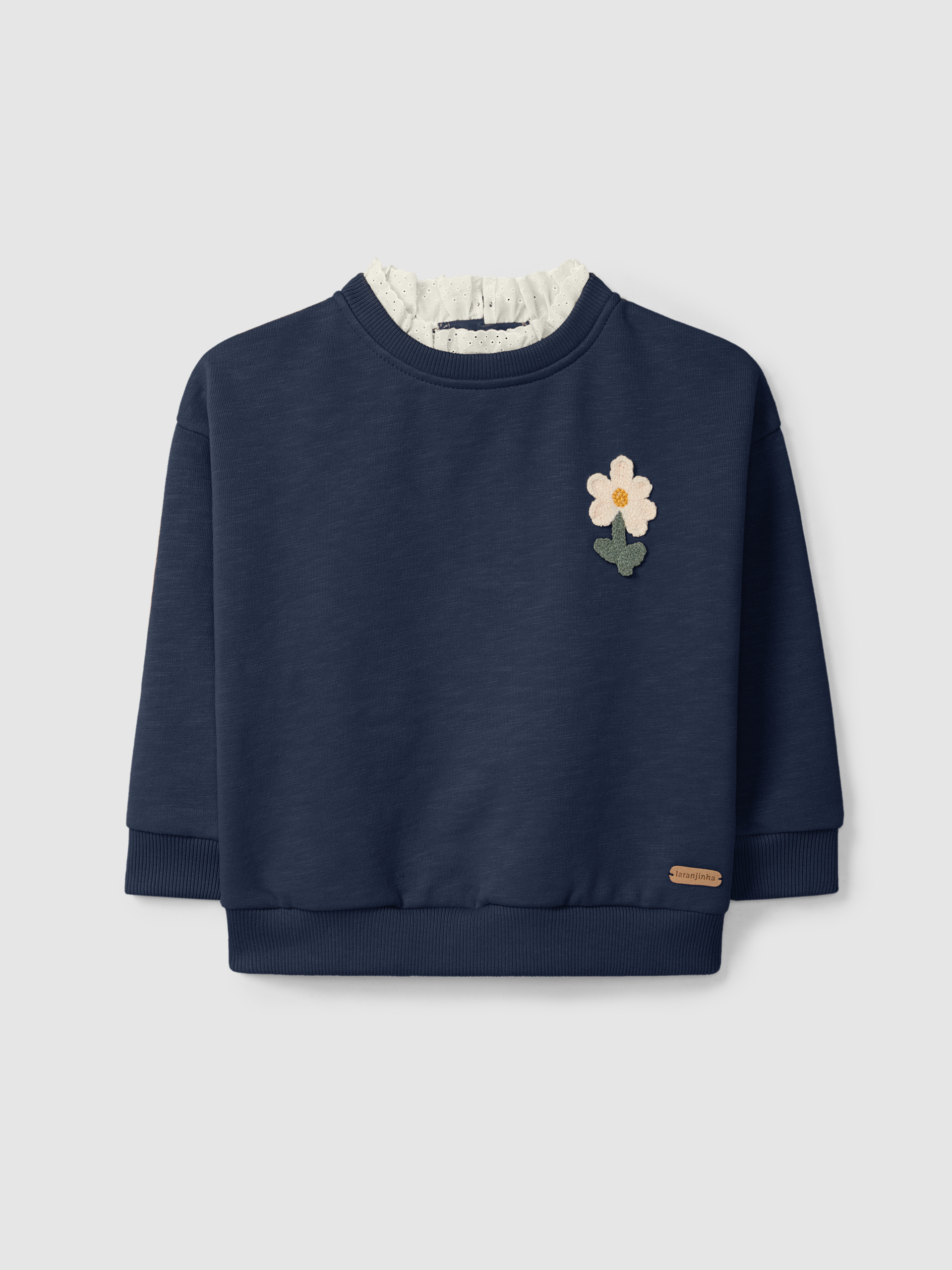 Sudadera flor y detalle de bordado inglés