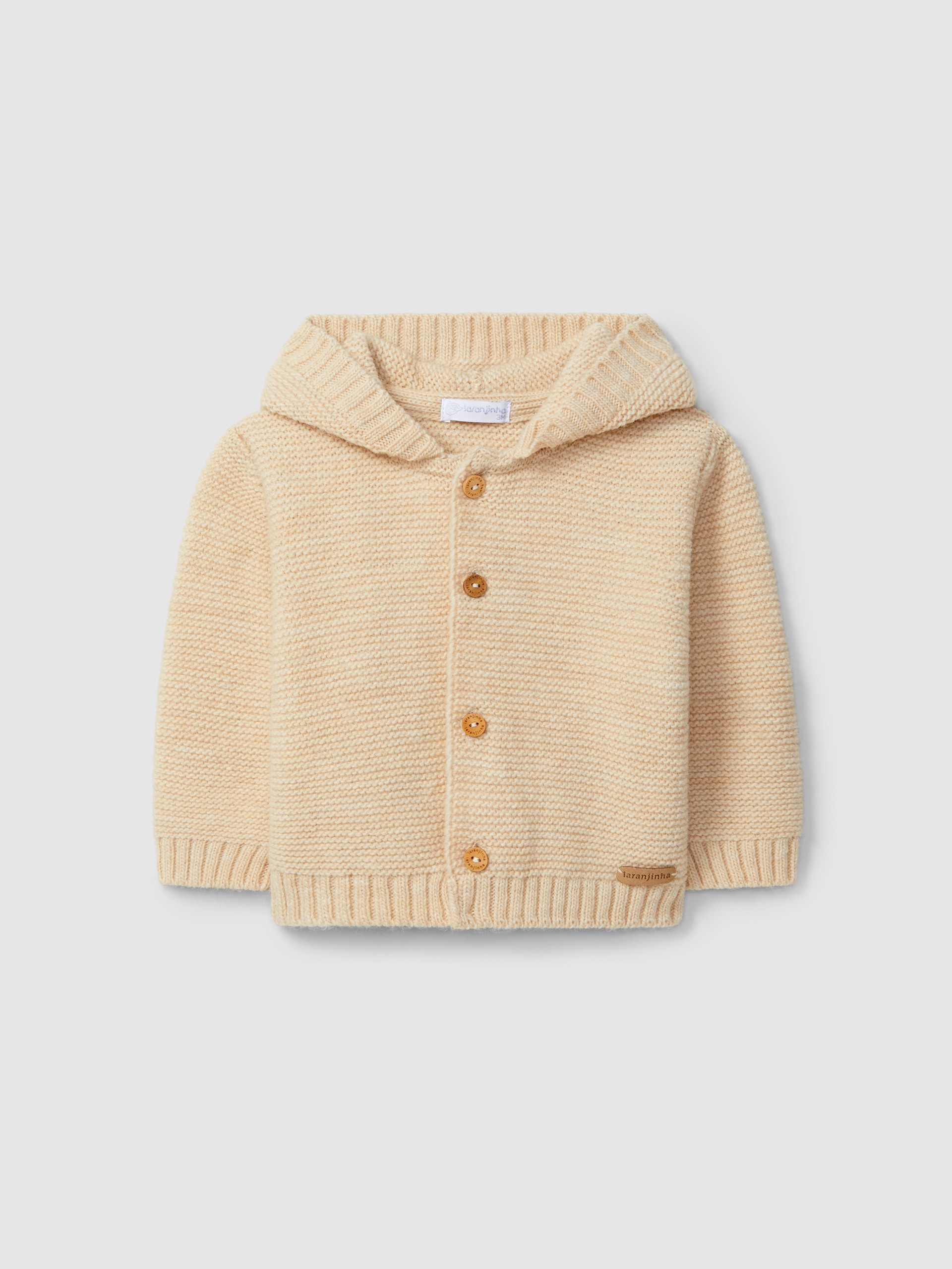 Gilet tricoté à capuche