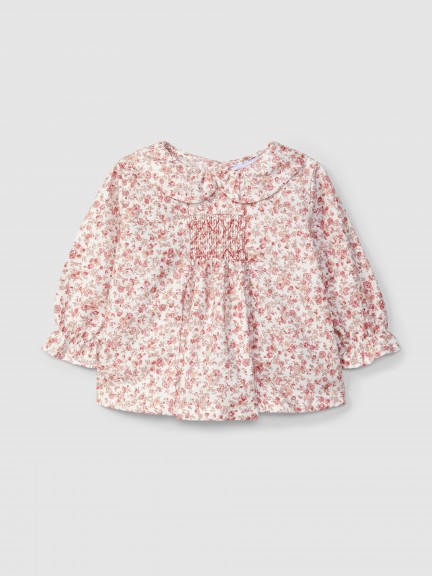 Blusa floral con smocks Blusa floral con smocks