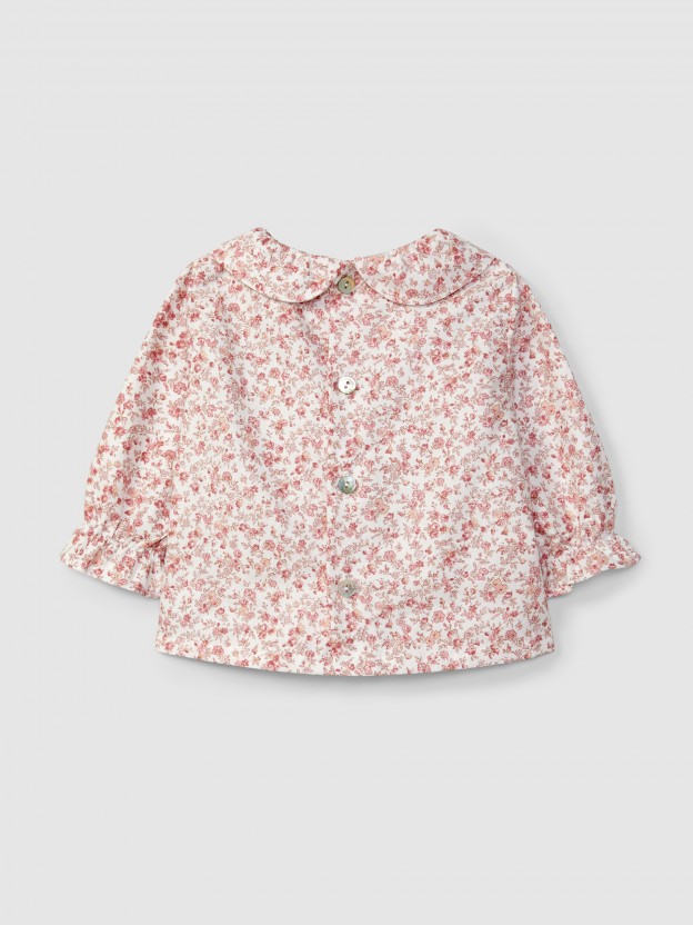 Blusa floral con smocks