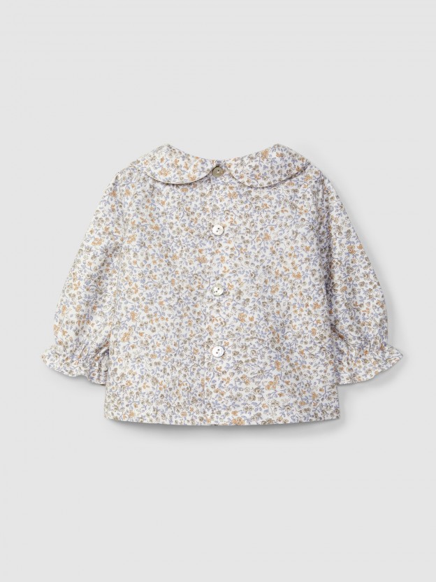 Blusa floral com smocks Blusa floral com smocks