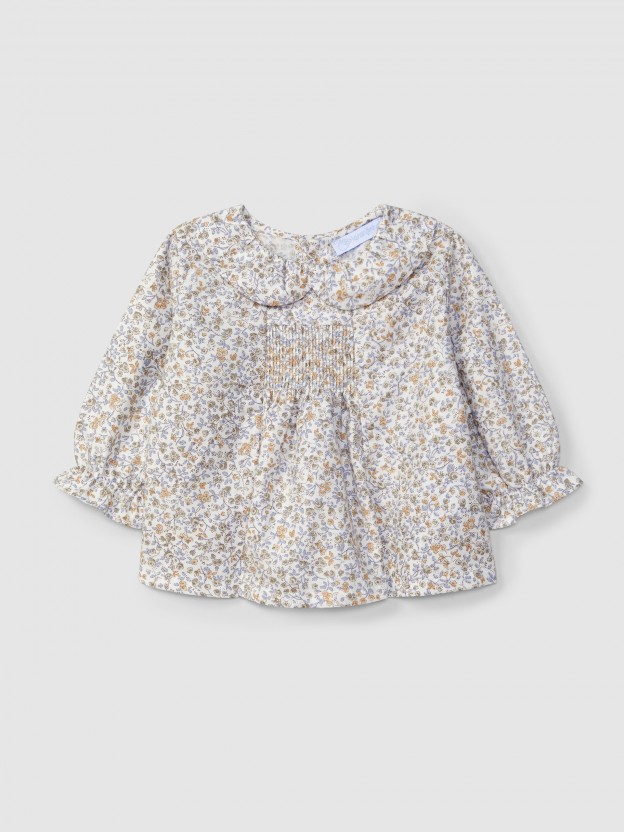Blusa floral com smocks Blusa floral com smocks