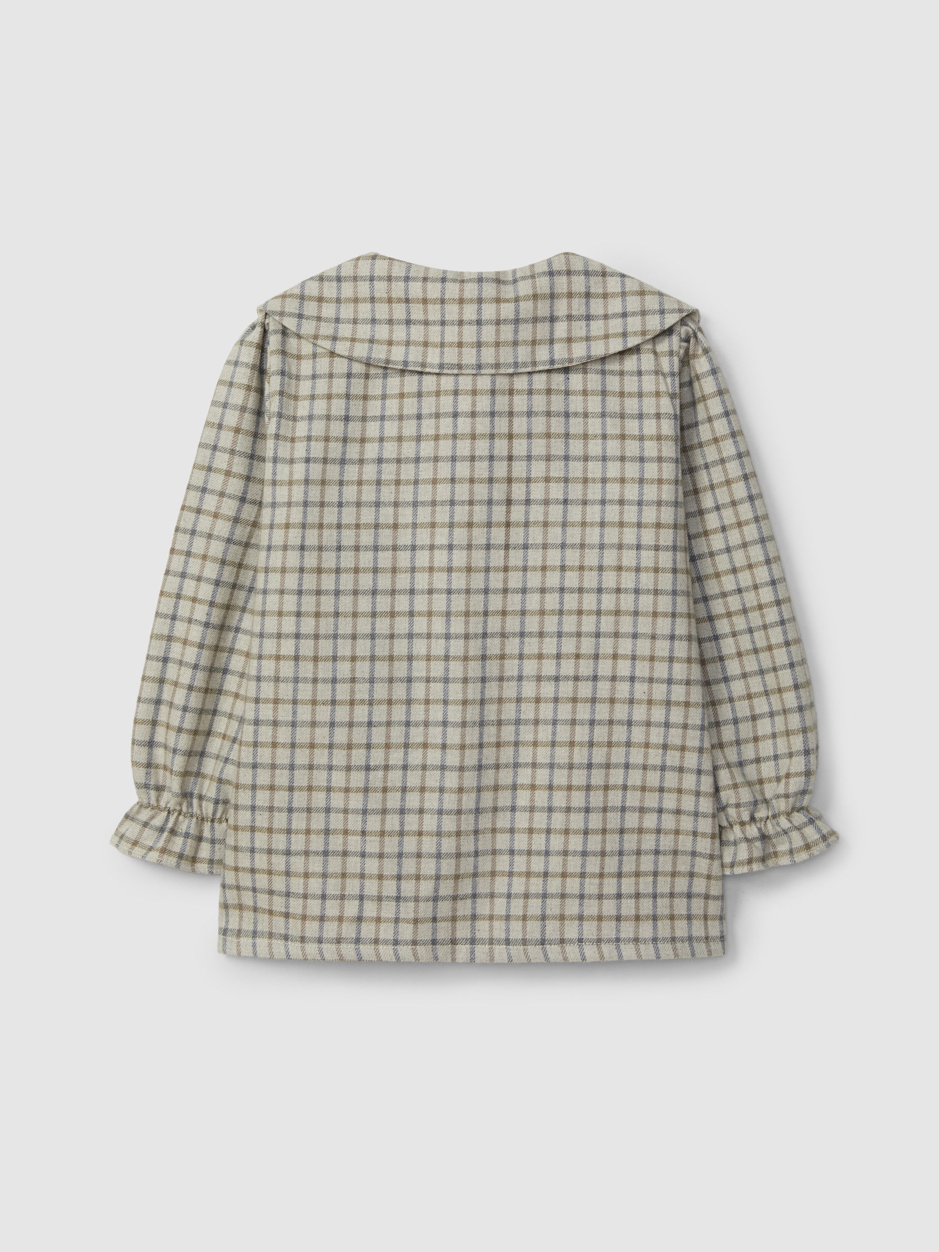 Blouse à carreaux avec broderie en fil de laine