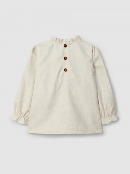 Blouse with smocking and ruffled details Blouse with smocking and ruffled details