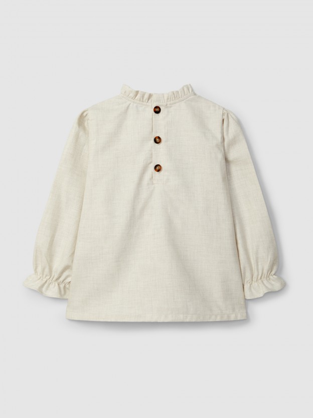 Blouse avec smocks et détails en volant Blouse avec smocks et détails en volant
