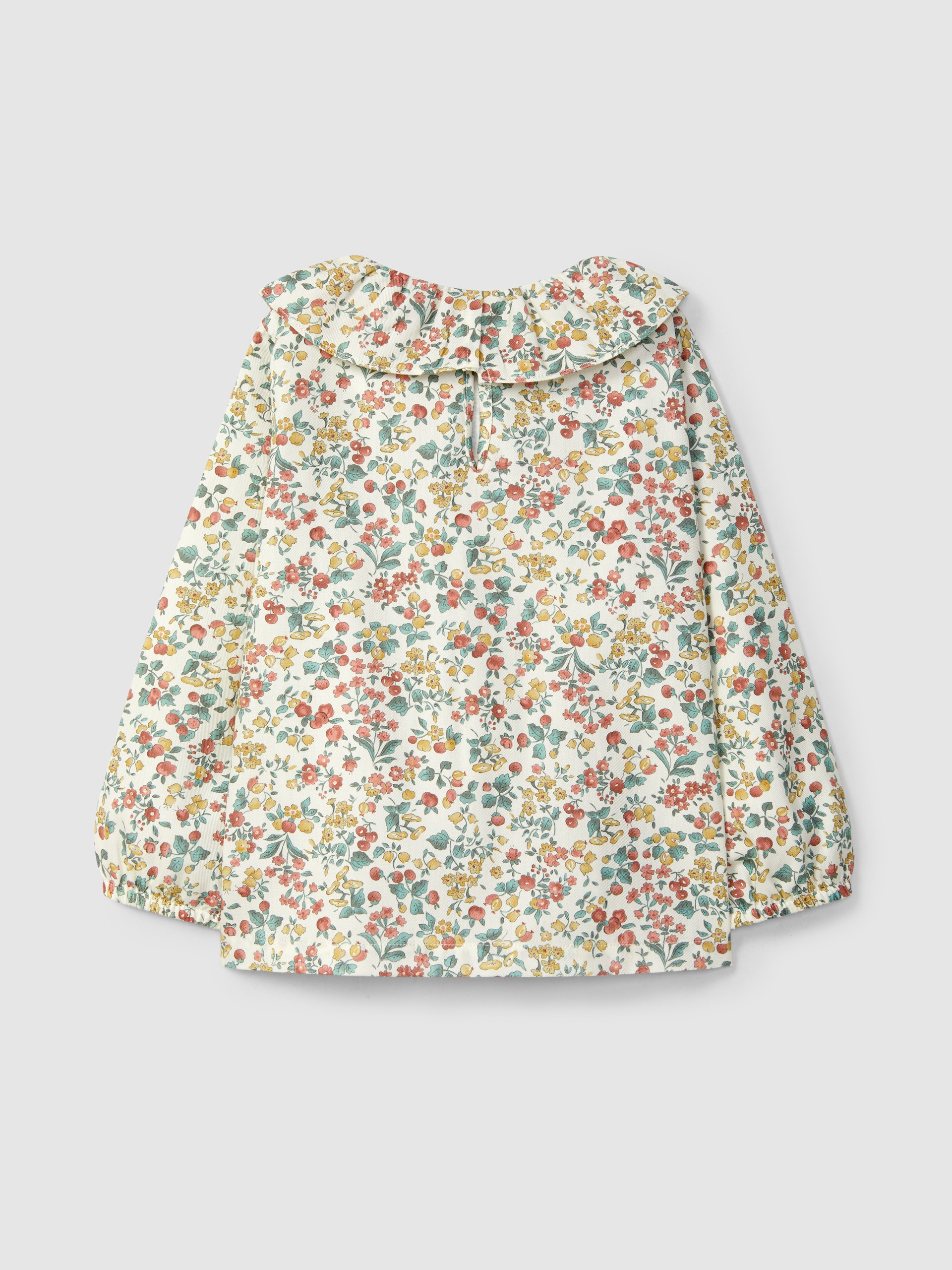 Blusa estampado floral y cuello de volante