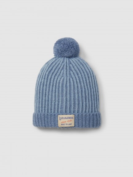 Gorro tricotado bicolor con pompón Gorro tricotado bicolor con pompón