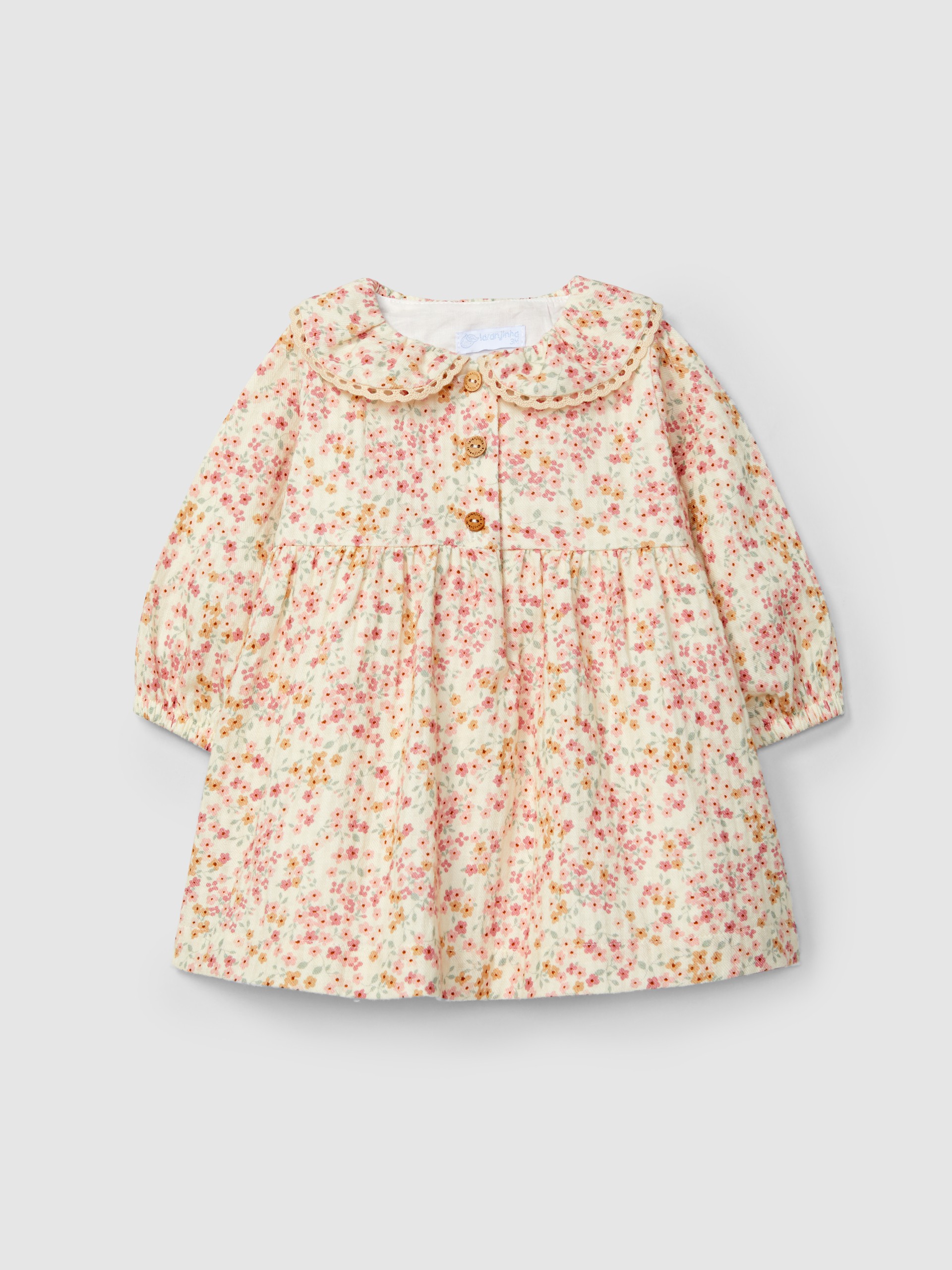 Robe à fleurs avec détail en dentelle au col