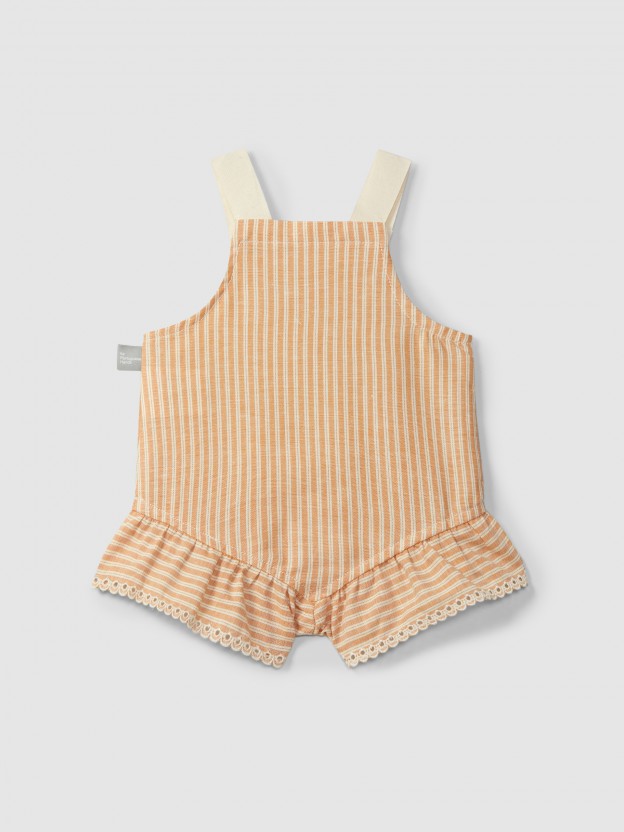 Overalls in striped fabric and English embroidery detail Overalls in striped fabric and English embroidery detail